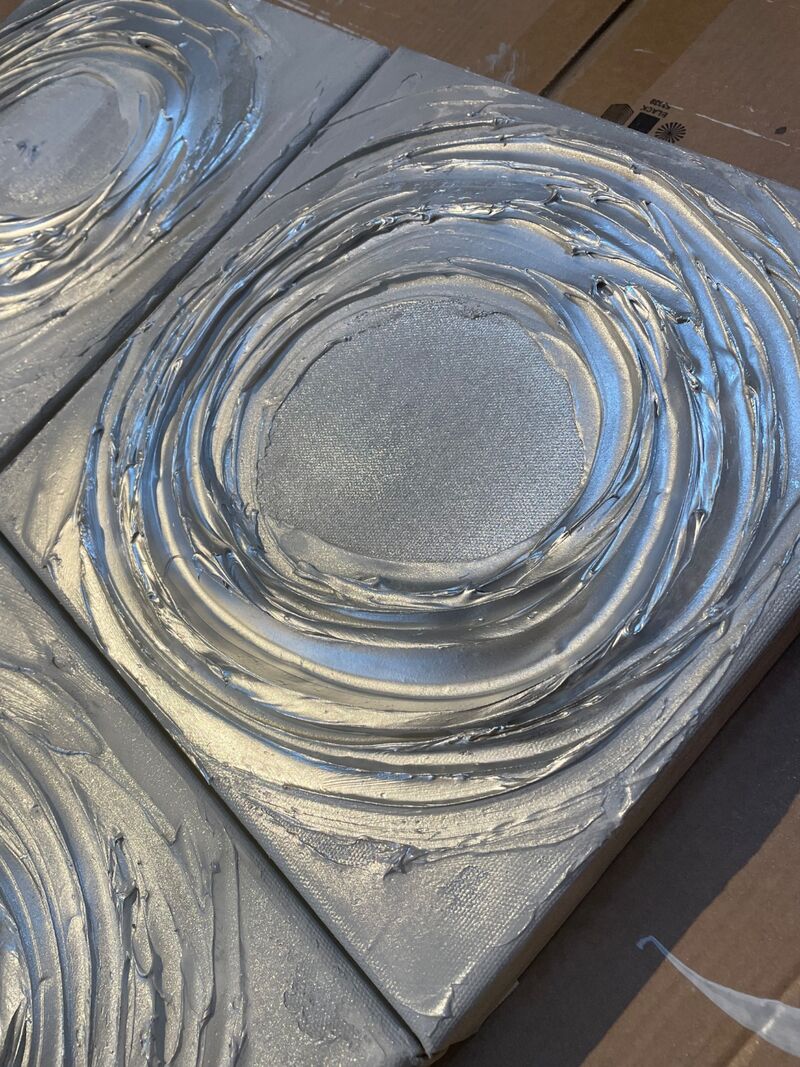 set of 4 x silver swirls close up