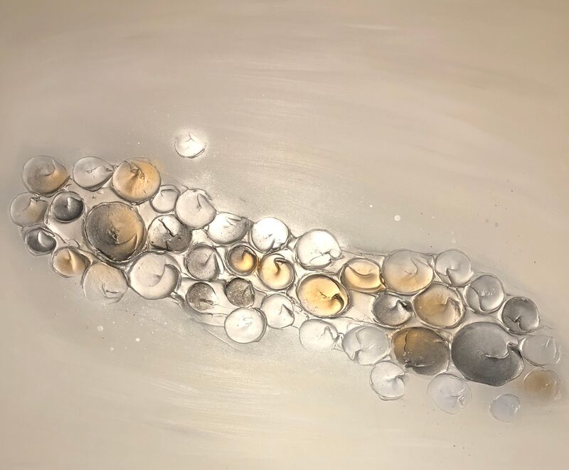 a silver and gold textured canvas