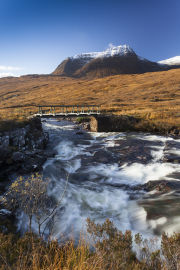 Beinn Alligin overlooks waterfalls on Abhainn Coire Mhic Nobuil, Torridon