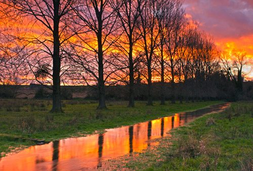 Sunset reflected in the River Allen