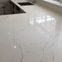Alabaster Quartz being installed Alabaster quartz being fitted Miss granite worktops / kitchens insynk solihull