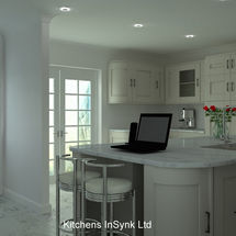 Alabaster units in shaker style and carrera quartz worktops designed by kitchens insynk ltd solihull