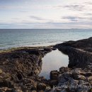 Towards Farne Islands from Bamburgh rock pools