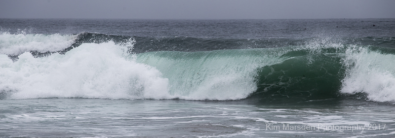 Beautifully lit waves on Bamburgh beach