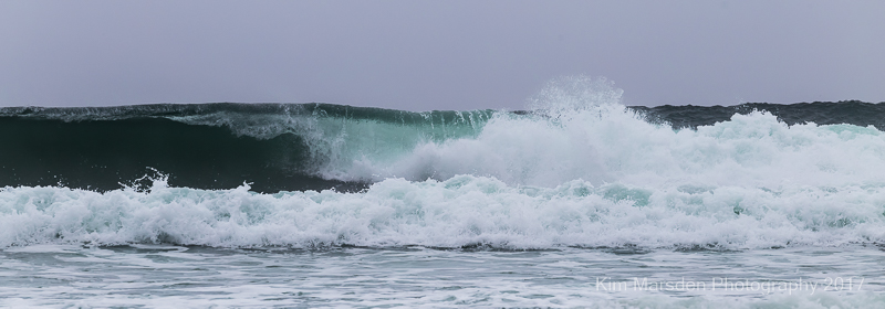 Beautifully lit waves on Bamburgh beach