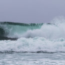 Beautifully lit waves on Bamburgh beach