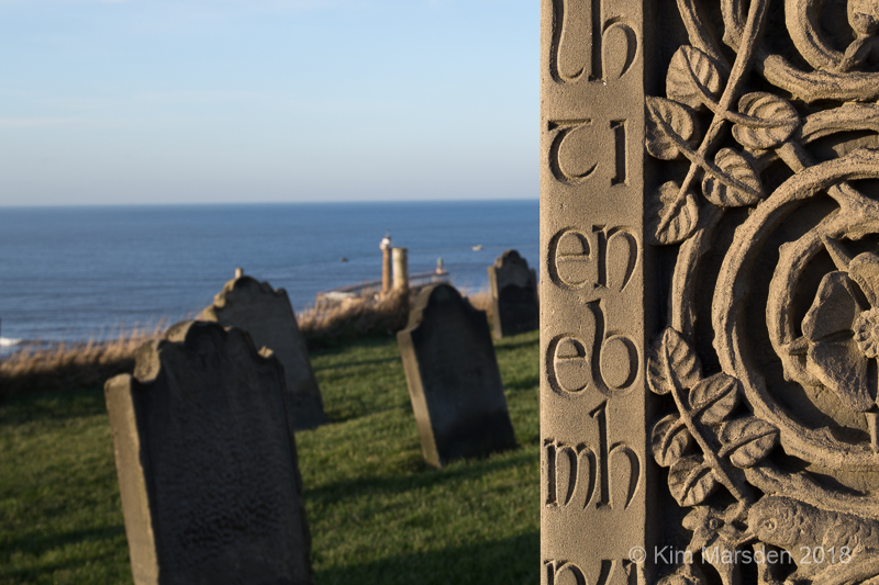 Caedmon’s Cross, St Mary's Church, overlooking graveyard & lighthouse - Whitby