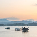 Boats on Windermere in sunset light
