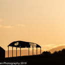 Backlit barn
