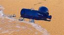 blue bottles on the beach-sandy brady - Judge Brian