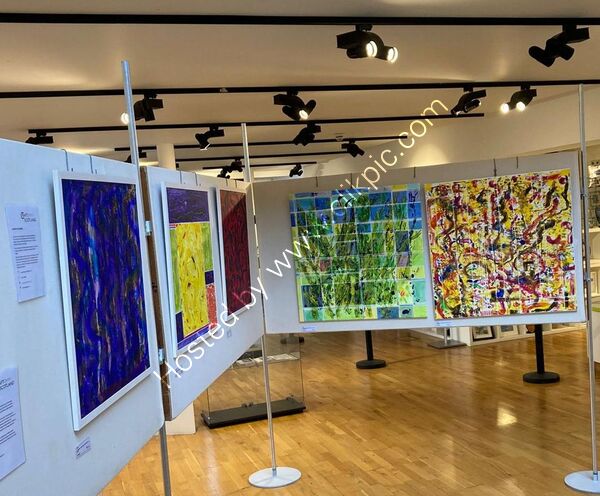 'Nature Triumphant ', 'Let Joy be Unconfined'. The grid lines cannot contain Nature's exuberance or the experience of joyful emotion.