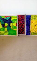 Selecting work for exhibition. A range of abstracts on board 2'x2'