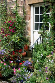 BEAUTY AT THE COTTAGE DOOR
