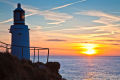Polperro lighthouse and sunrise