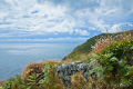 Stone wall and clouds