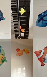Bathroom tropical fish in enamel paints.