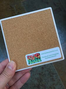 Lisa Dear Artworks Brand Sticker on Ceramic Coaster