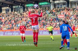 Sanne Troelsgaard (#7 Denmark) with a header in the World Cup qualifier Denmark vs Azerbaijan at Energi Viborg Arena in Viborg, Denmark