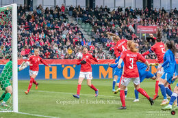 Karen Holmgaard (#4 Denmark) with a header in the World Cup qualifier Denmark vs Azerbaijan at Energi Viborg Arena in Viborg, Denmark