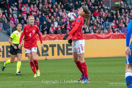 Sofie Junge (#13 Denmark) controlling the ball in the World Cup qualifier Denmark vs Azerbaijan at Energi Viborg Arena in Viborg, Denmark