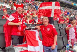 Happy Danish fans in the stands in the Women's Euro 2022 match Denmark vs Finland at Stadium MK, Milton Keynes, England