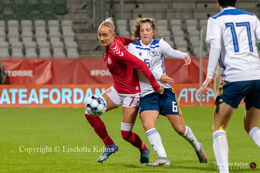 Sanne Troelsgaard (#7 Denmark) battling for the ball in the World Cup qualifier Denmark vs Bosnia and Herzegovina at Energi Viborg Arena in Viborg, Denmark