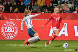 Sofie Svava (#23 Denmark) battling for the ball in the World Cup qualifier Denmark vs Bosnia and Herzegovina at Energi Viborg Arena in Viborg, Denmark