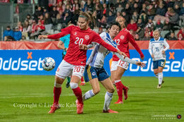Signe Bruun (#22 Denmark) controlling the ball in the World Cup qualifier Denmark vs Bosnia and Herzegovina at Energi Viborg Arena in Viborg, Denmark