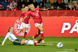 Pernille Harder (#10 Denmark) battling for the ball in the World Cup qualifier Denmark vs Bosnia and Herzegovina at Energi Viborg Arena in Viborg, Denmark