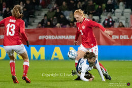 Stine Ballisager (#3 Denmark) battling for the ball in the World Cup qualifier Denmark vs Bosnia and Herzegovina at Energi Viborg Arena in Viborg, Denmark