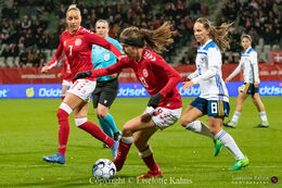 Sofie Junge (#13 Denmark) controlling the ball in the World Cup qualifier Denmark vs Bosnia and Herzegovina at Energi Viborg Arena in Viborg, Denmark