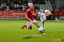 Pernille Harder (#10 Denmark) controlling the ball in the World Cup qualifier Denmark vs Bosnia and Herzegovina at Energi Viborg Arena in Viborg, Denmark
