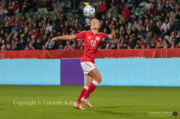 Pernille Harder (#10 Denmark) with a header in the World Cup qualifier Denmark vs Bosnia and Herzegovina at Energi Viborg Arena in Viborg, Denmark