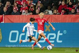 Pernille Harder (#10 Denmark) battling for the ball in the World Cup qualifier Denmark vs Bosnia and Herzegovina at Energi Viborg Arena in Viborg, Denmark