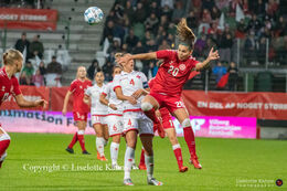Signe Bruun (#20 Denmark) jumping for the ball in the World Cup qualifier Denmark vs Malta at Energi Viborg Arena in Viborg, Denmark