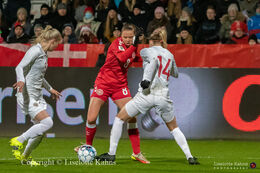 Emma Snerle (#8 Denmark) battles for the ball in the World Cup qualifier Denmark vs Russia at Energi Viborg Arena in Viborg, Denmark