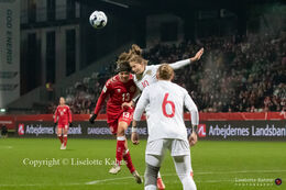 Sofie Junge (#13 Denmark) battles for the ball in the World Cup qualifier Denmark vs Russia at Energi Viborg Arena in Viborg, Denmark
