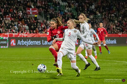 Signe Bruun (#20 Denmark) battles for the ball in the World Cup qualifier Denmark vs Russia at Energi Viborg Arena in Viborg, Denmark