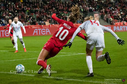 Caroline Moller (#10 Denmark) preparing for a shot in the World Cup qualifier Denmark vs Russia at Energi Viborg Arena in Viborg, Denmark
