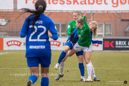 "Oreo" sandwich :-)  in the "Gjensidige Kvindeliga" match between Fortuna Hjorring and FB Koge at Hjorring stadium in Hjorring, Denmark