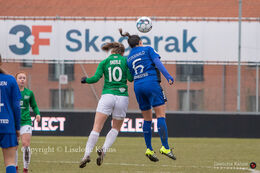 Emma Snerle (#10 Fortuna Hjorring) and Kelly Fitzgerald (#6 FB Koge) battle for the bal in the "Gjensidige Kvindeliga" match between Fortuna Hjorring and HB Koge at Hjorring stadium in Hjorring, Denmark