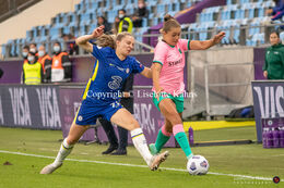 Niamh Charles (#21 Chelsea) and Lieke Martens (#22 FC Barcelona) battle for the ball in the UEFA Women's Champions League Final, Chelsea vs. FC Barcelona
