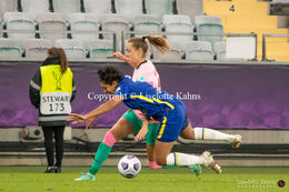 Caroline Hansen (#16 FC Barcelona) and Jess Carter (#7 Chelsea) battle for the ball in the UEFA Women's Champions League Final, Chelsea vs. FC Barcelona