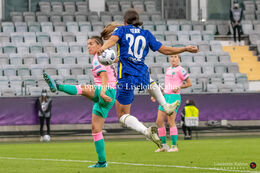 Sam Kerr (#20 Chelsea) jumping for the ball in the UEFA Women's Champions League Final, Chelsea vs. FC Barcelona