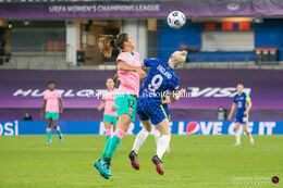 Bethany England (#9 Chelsea) and Guijarro Gutierrez (#12 FC Barcelona) battle for the ball in the UEFA Women's Champions League Final, Chelsea vs. FC Barcelona