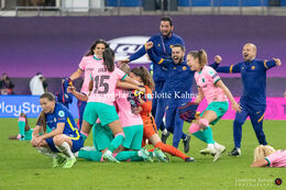 ran Kirby (#14 Chelsea) is devastated by the defeat while the FC Barcelona players celebrate the victory in the UEFA Women's Champions League Final, Chelsea vs. FC Barcelona