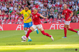 Sanne Troelsgaard (#7 Denmark) battles for the ball in the friendly match Denmark vs Brazil at Parken Stadium, Copenhagen, Denmark