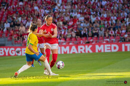 Sanne Troelsgaard (#7 Denmark) battles for the ball in the friendly match Denmark vs Brazil at Parken Stadium, Copenhagen, Denmark