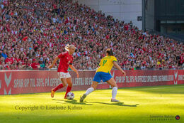 Pernille Harder (#10 Denmark) on the ball in the friendly match Denmark vs Brazil at Parken Stadium, Copenhagen, Denmark