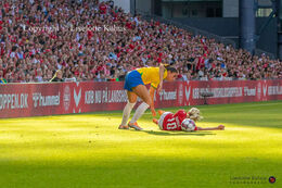 Pernille Harder (#10 Denmark) is sent down in the friendly match Denmark vs Brazil at Parken Stadium, Copenhagen, Denmark